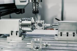 Advanced CNC center performing precision machining Texas for aerospace parts