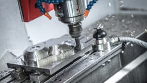 Swiss CNC machining of aerospace electrical components including sleeve conduits and mounting sleeves at AS9100-certified facility