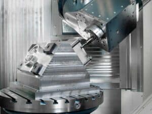 5-axis CNC milling machine producing complex precision machined components in a single setup